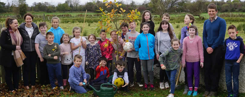 Mary Harrison, Principal, teachers & pupils of St Aidans NS Ballintrillick, Sligo in garden