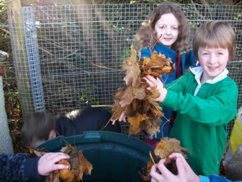 Children looking after the compost at St. Aidans School Ballintrillick